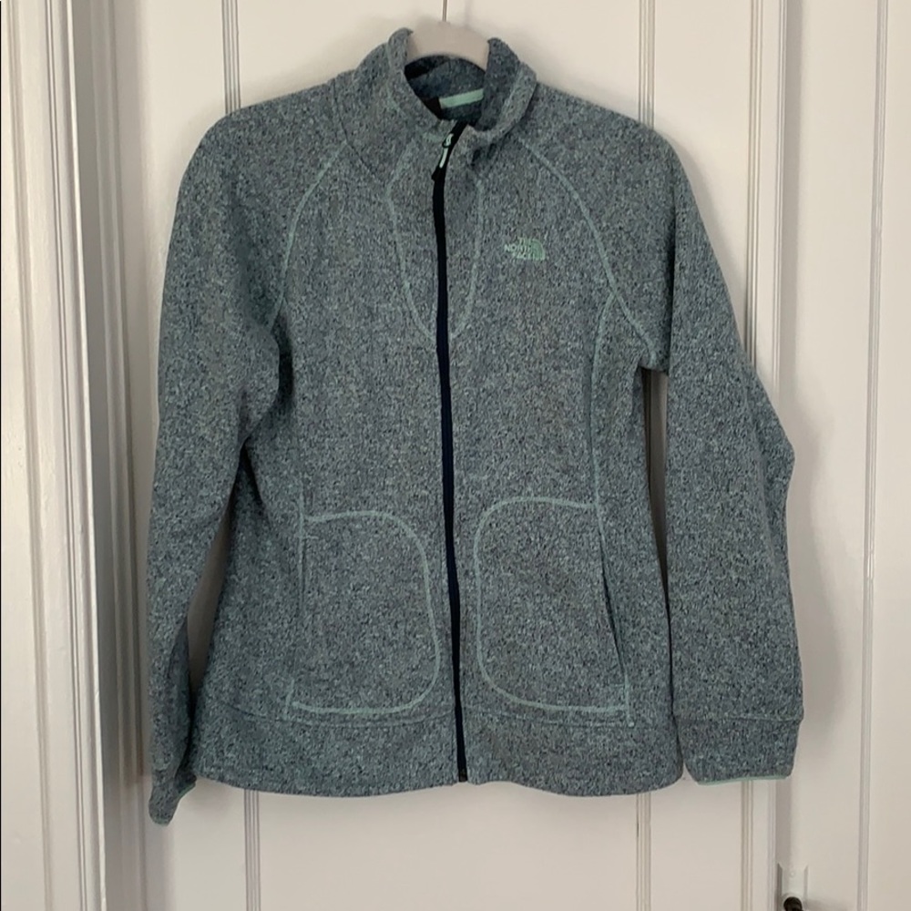 The North Face blue fleece zip-up jacket